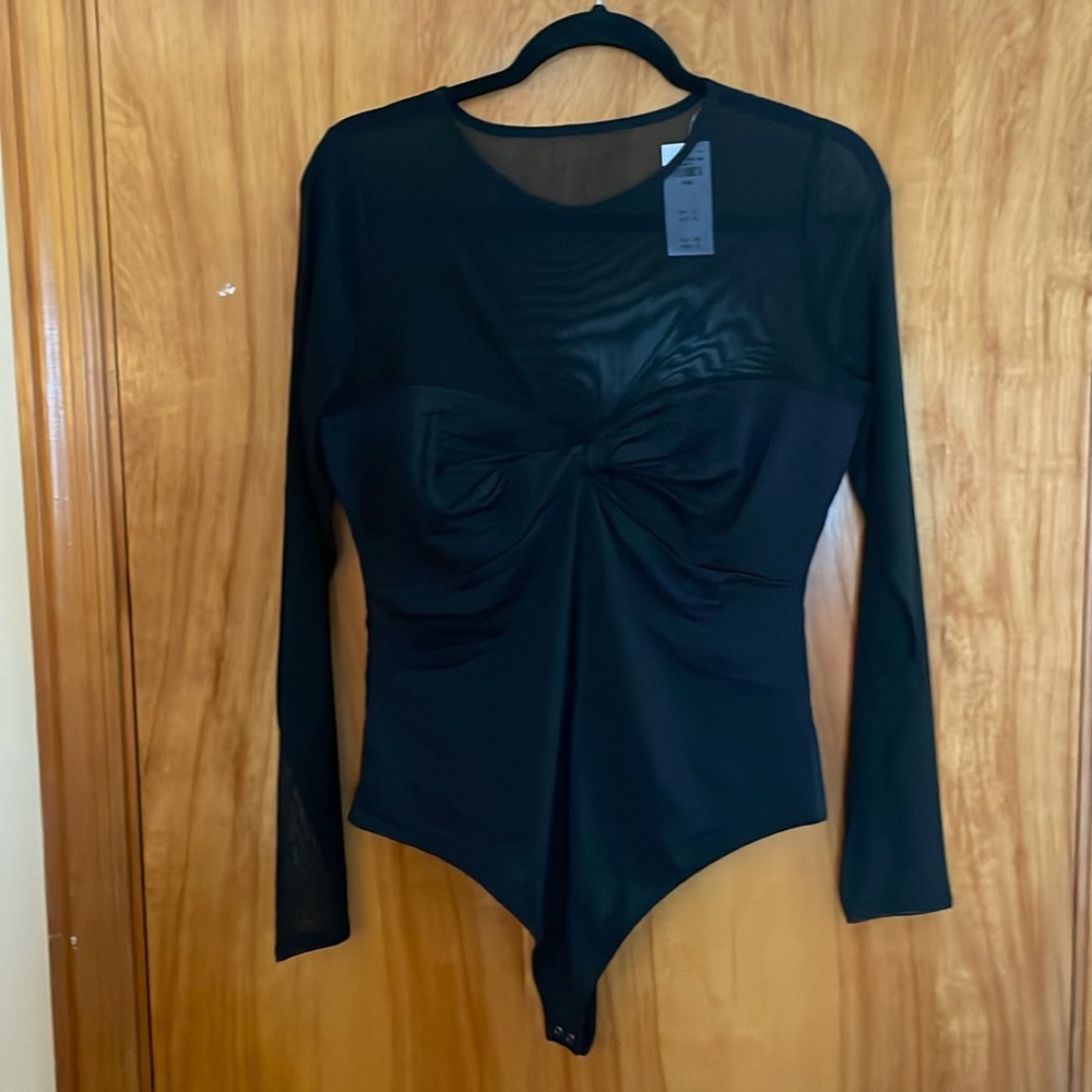 Abercrombie & Fitch women’s body suit. Shear arms and chest.  Size large